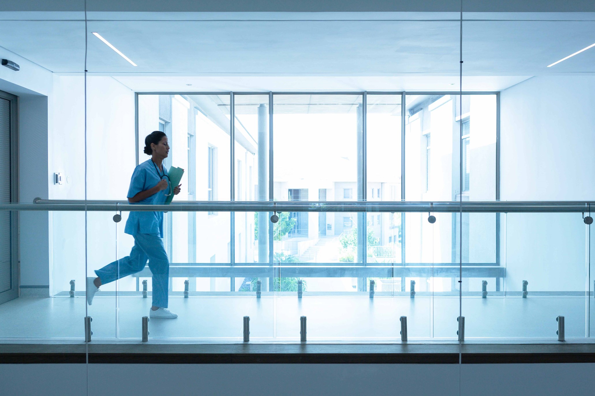 Nurse running in the passageway